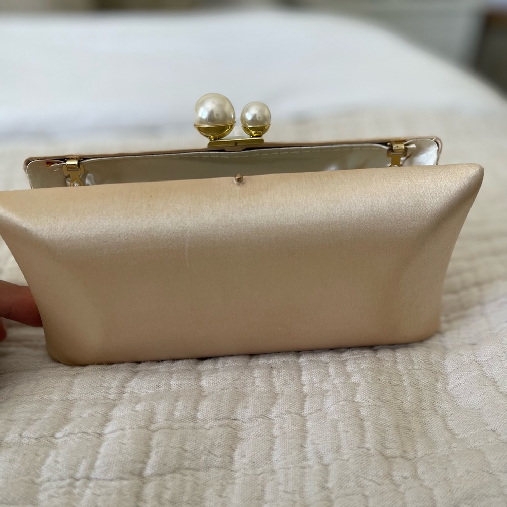 Small champagne clutch from charming Charlie